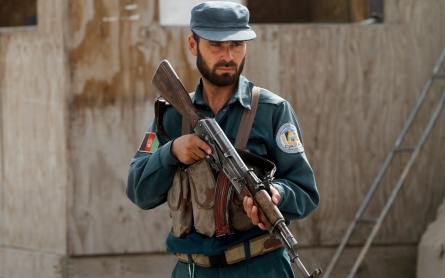 Taliban infiltrator drugs, kills 10, Afghan police officials say