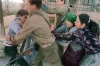 <b>Ramallah, 1988.</b> A Palestinian mother and elder sister try to stop an Israeli soldier from taking away a Palestinian boy arrested for rock throwing. The First Intifada ended in 1993, when the Oslo peace accords were signed. 