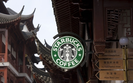 China takes on Starbucks, biting a hand that feeds it, analysts say