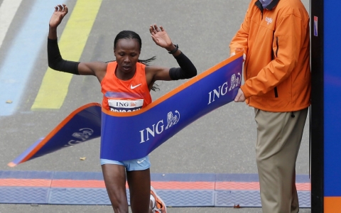 Priscah Jeptoo of Kenya crosses the finish line