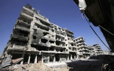 A devastated street in Syria's central city of Homs. Photo credit: JOSEPH EID/AFP/Getty Images