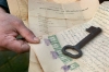 <b>West Bank, 2001.</b> A 67-year-old Palestinian man in the Dehaishe refugee camp displays the original key and title deeds to the home his family abandoned when they fled their village in the 1948 war in Israel. For many Palestinians, the keys remain a potent symbol of their exile status. 