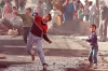 <b>Ramallah, 1988.</b> Children throw stones at Israeli soldiers in the Amari refugee camp. After they had been stuck in limbo for close to four decades, Palestinians’ anger erupted in open protests in the late 1980s, a movement commonly referred to as the First Intifada. 