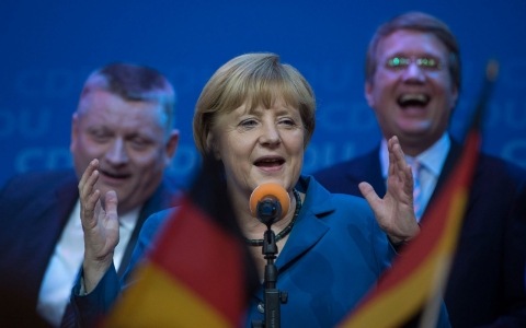 German Chancellor Angela Merkel celebrates at the Christian Democratic Union (CDU) party's headquarters in Berlin.