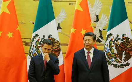 Mexico president pushes trade ties in China while protests rage at home