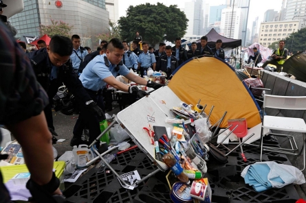 Hong Kong police clear pro-democracy protest camp, arresting dozens