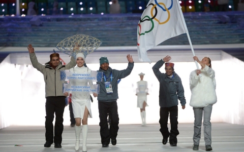 India's three Winter Olympians walked under a generic Olympic flag at the Sochi 2014 opening ceremony due to their country's suspension.