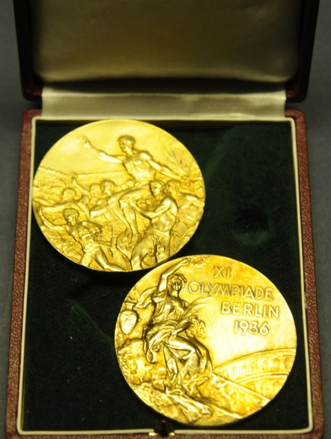 A detail photo of the 1936 gold medals.