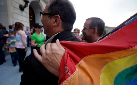 First gay couples wed in Little Rock