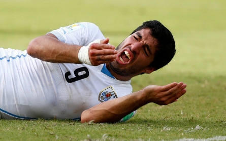 Uruguay’s Suárez to miss rest of World Cup over biting incident