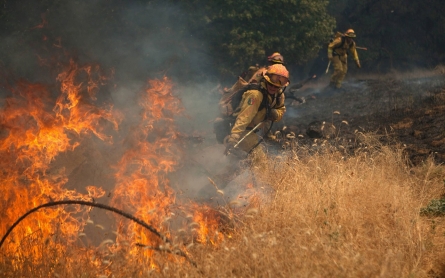 Fire teams battle two fast-moving California blazes