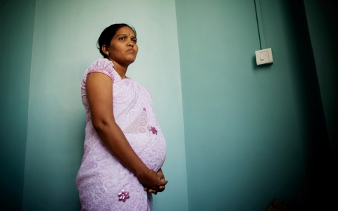 An Indian surrogate mother located in Mumbai shown in a file photo from 2012.