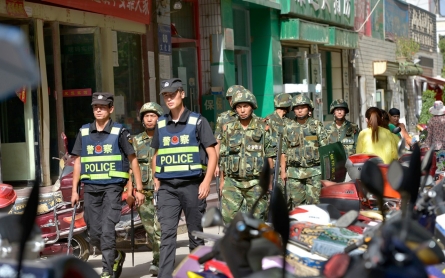 China: 96 dead in Xinjiang attacks last week