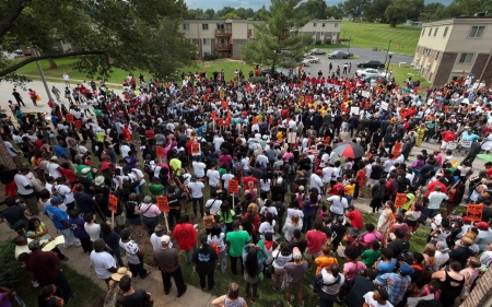 Protesters rally three weeks after police shooting of Michael Brown