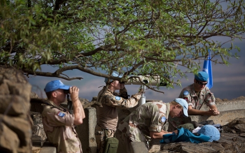 Thumbnail image for UN peacekeepers rescued amid firefight in Syria