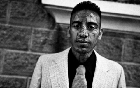 A former member of the 18th Street Gang (M-18) seen on his way to the church on May 12, 2011 in El Salvador. 