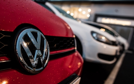 VW to cut investments by $1.1B a year, develop hybrid and electric cars