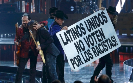 Musicians at Latin Grammys tell viewers: ‘Don’t vote for racists'