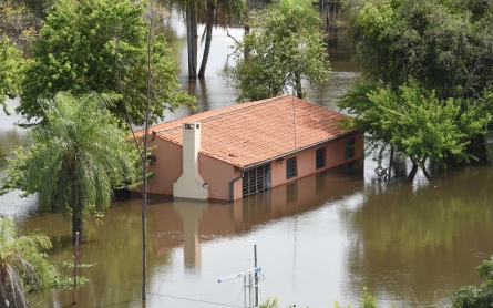 Latin America flooding forces over 100,000 to flee