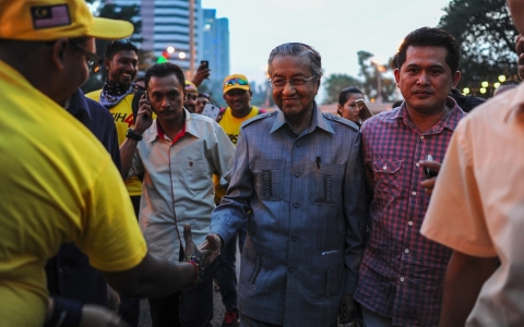 Thumbnail image for Protests grip Malaysia's capital as ex-PM Mahathir urges 'people power'