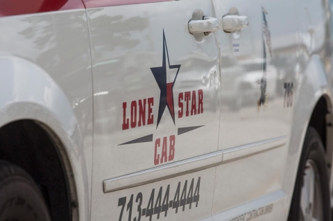 A Lone Star Cab is seen outside of George Bush Intercontinental Airport, Sept. 9, 2015, in Houston.