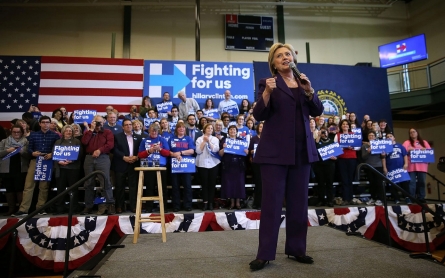 Clinton takes Iowa, beating back Sanders' strong challenge