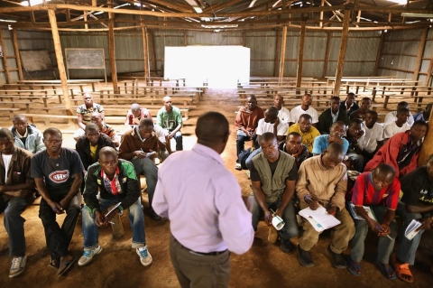 Teacher Alphonse Senyoni leads a class on history, politics and the 1994 genocide for former FDLR)combatants at the Mutobo Demobilisation Centre on April 10, 2014.