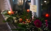 Flowers and a note saying 'Je suis Charlie' are placed in front of the French Embassy in the German capital Berlin.