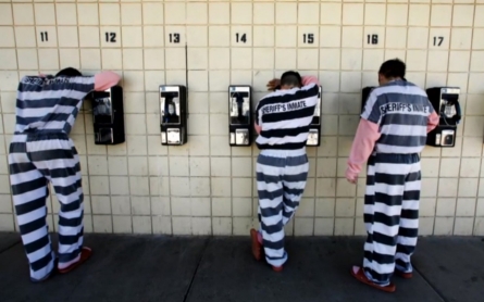 Who profits from the billion-dollar prison phone business?