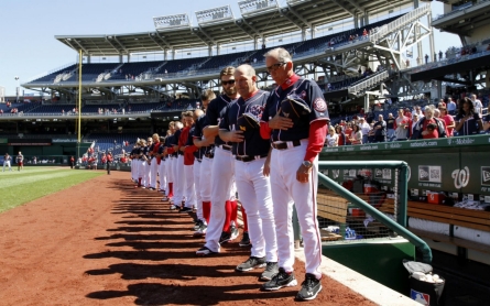 Day after Navy Yard shootings, somberness hangs over Nationals game