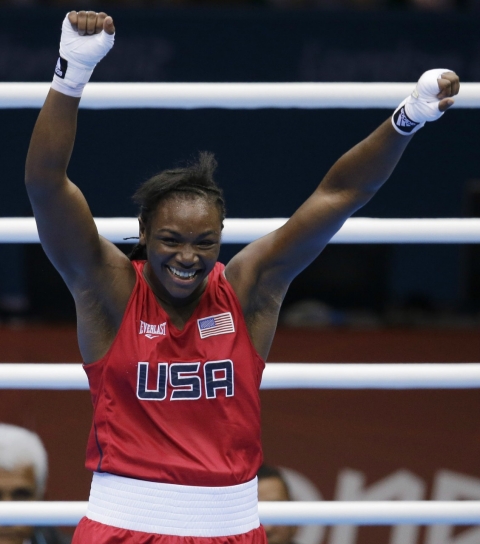 At the 2012 Summer Games, Claressa Shields celebrates after winning her Gold Medal bout against Russia's Nadezda Torlopova.