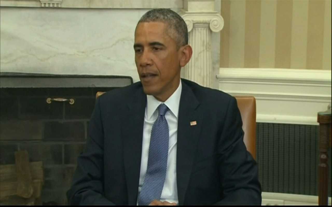 President Obama reacts to the shootings in Paris