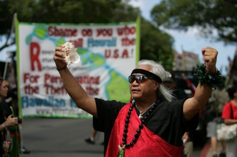 Native Hawaiian activists march in Honolulu, 2009. (AP/ Marco Garcia)